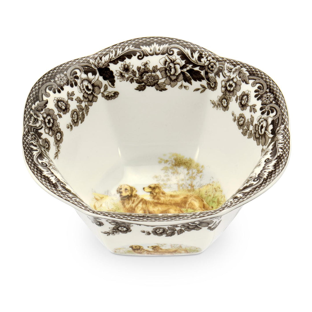 A 6 inch white china nut bowl with brown floral patterns and a wildlife scene in the center.