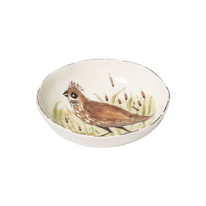 hand-painted quail scene on white pasta bowl side view